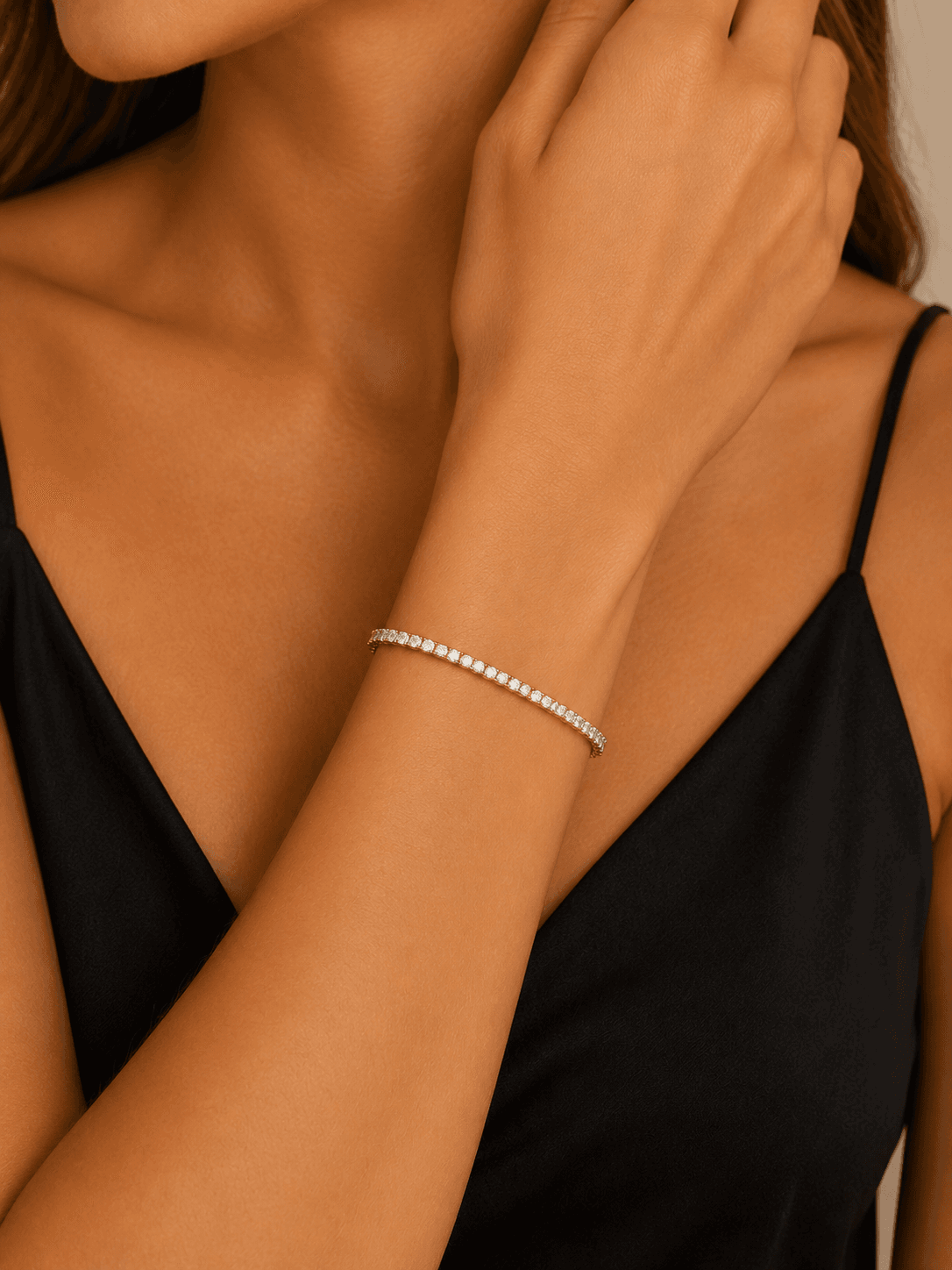 Diamond tennis bracelet worn on the wrist